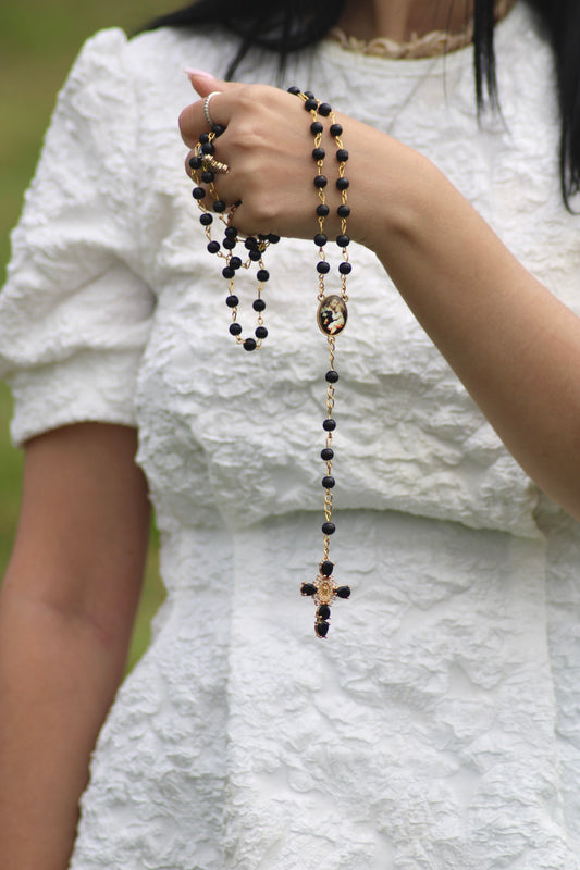 Chapelet noir et dorée ( Médaillon de Saint Joseph et Jésus Enfant )